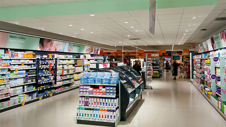 Good aisles lighting guiding customer through the store at Consume Supermarkets, Valencia