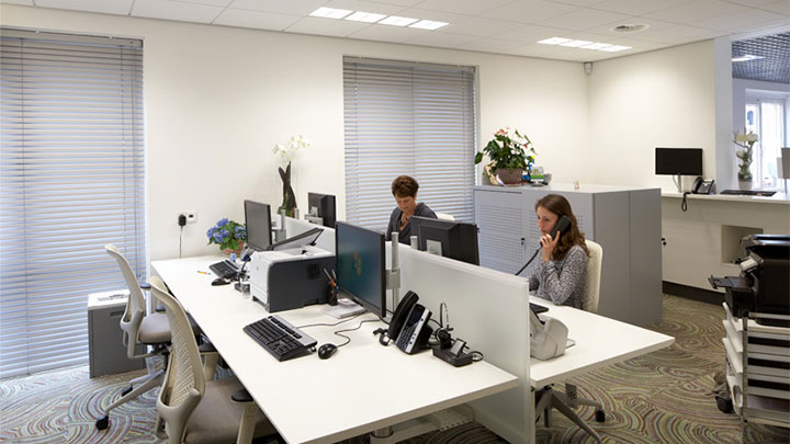 The office at Lindehof Health Centre illuminated by Philips