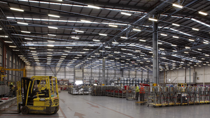 Royal Mail NDC warehouse lit by high-bay lighting of Philips Lighting