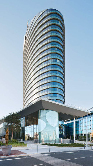 The façade of the Tour Sequana bulding, lit by Philips office lighting 
