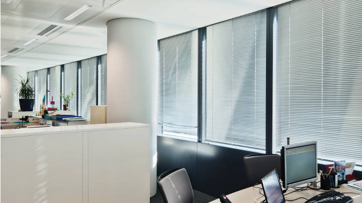 Philips office lights are mounted in the ceiling of this Tour Sequana office 