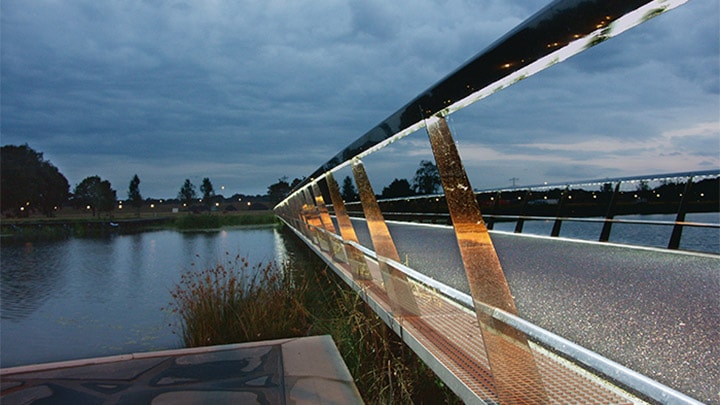 Bridge at High Tech Campus start illuminating as the sun goes down 