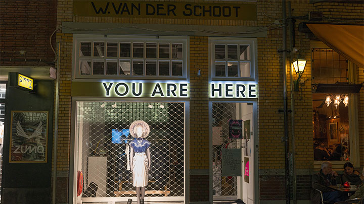 Enlightend shop window of the you are here fashion store